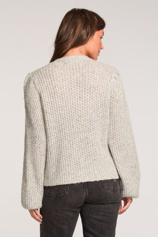 Saltwater Luxe Long Sleeve Bow Sweater in Heather Grey
Person wearing a textured beige sweater on a plain background