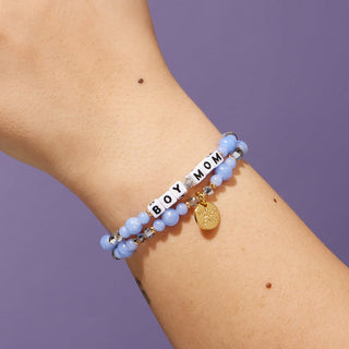 Little Words Project Bracelet - Boy Mom
Bracelet with 'BOY MOM' charm on a wrist against a purple background