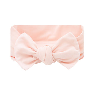 Lou Lou and Company Headband - Sophie
Pink headband with a bow on a white background