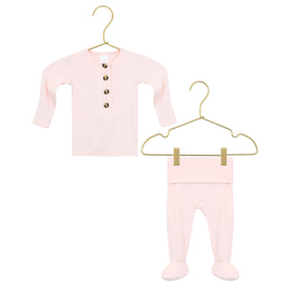 Lou Lou and Company Top and Bottoms - Sophie
Pink baby outfit with a shirt and pants on gold hangers against a white background