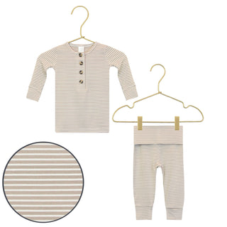 Lou Lou and Company Top and Bottoms - Banks
Striped baby outfit with shirt and pants on hangers against a white background
