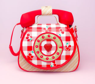 Ring Ring Phone Convertible Handbag - Cherry Red and white checkered handbag with a phone design on a pink background