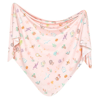Copper Pearl Disney Enchanted Friends Knit Swaddle Blanket
Pink baby blanket with colorful patterns on a white background
