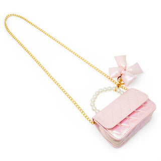 Zomi Gems Shiny Quilted Fluffy Bow Handbag - Pink
Pink handbag with a gold chain and bow on a white background