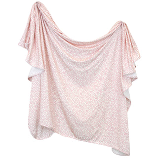 Lou Lou and Company Swaddle Blanket - Flora
Pink floral patterned blanket on a white background