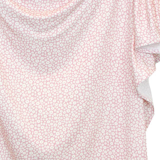 Lou Lou and Company Swaddle Blanket - Flora
Close-up of a pink floral patterned fabric