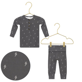 Lou Lou and Company Top and Bottoms - Everett
Children's dark gray outfit with lightning bolt pattern on hangers against a white background