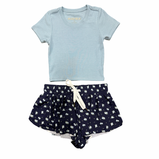 KatieJ NYC Tween Livi Ribbed Babydoll S/S Tee - Glacier Blue Light blue t-shirt and navy shorts with white patterns on a white background