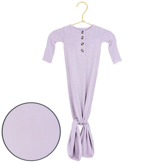 Lou Lou and Company Knotted Gown - Isabelle
Lavender baby dress with buttons on a hanger against a white background