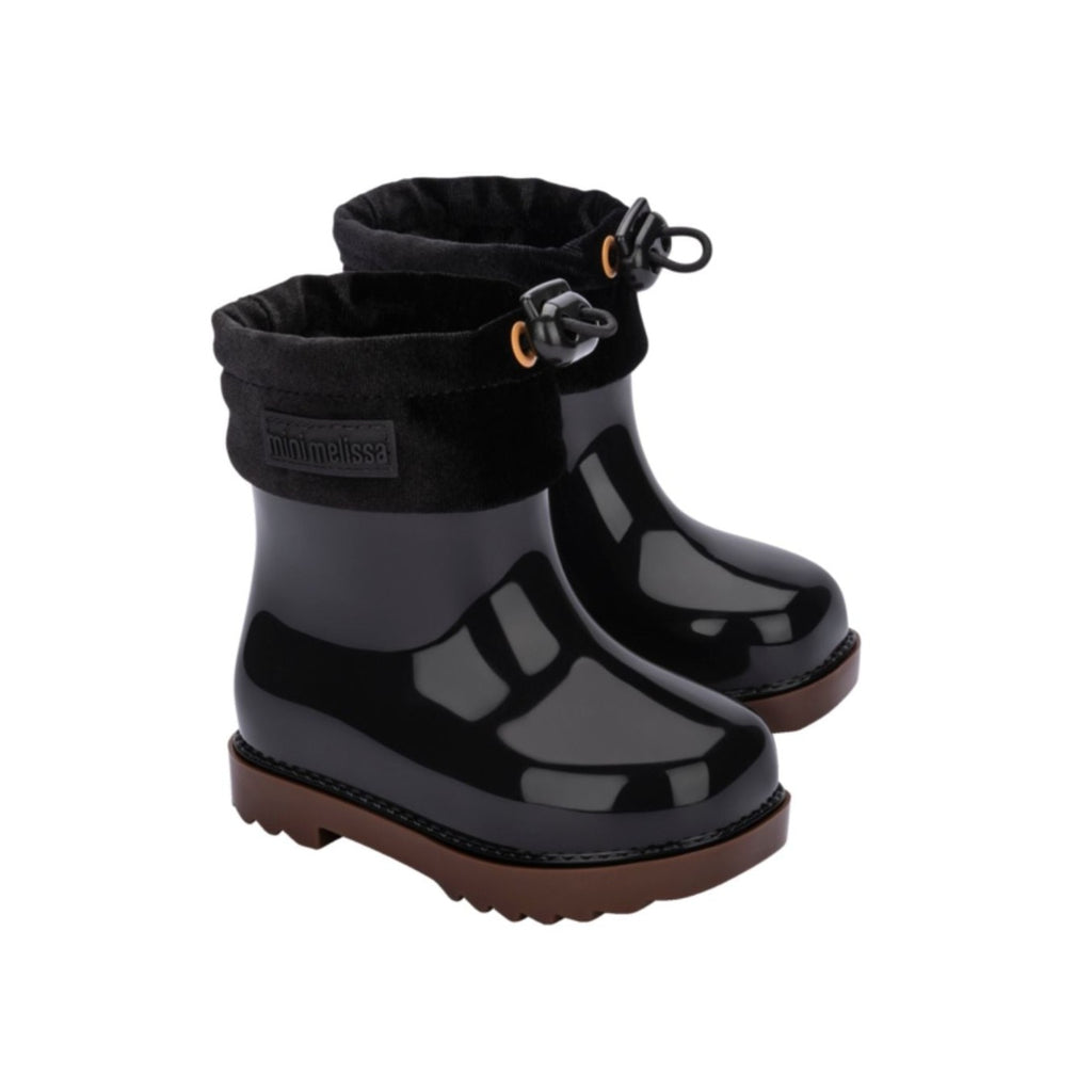 Mini melissa black boots discount