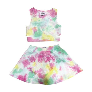 Lola & The Boys tie dye tennis activewear set featuring a sleeveless top and matching shorts in vibrant colors.