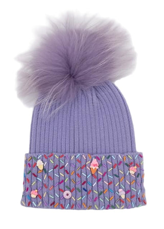 Bari Lynn Sprinkle Treat Cuff Beanie with Fur Pom - Lavender
Purple knit beanie with a large fluffy pom-pom on a white background