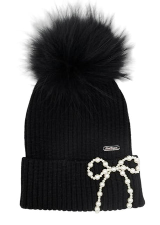 Bari Lynn Beanie with Pearl Bow - Black
Black knit beanie with a large black fur pom-pom and a decorative bow with pearls on a white background.