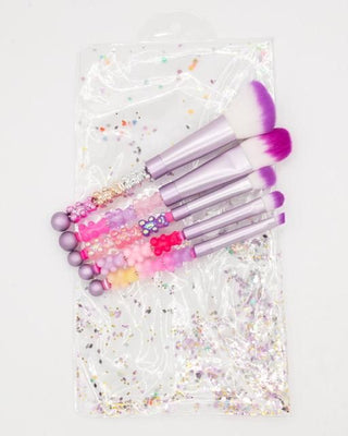 Bari Lynn Charm Handle 5pc Makeup Brush Set
Set of colorful makeup brushes on a glittery surface with a white background