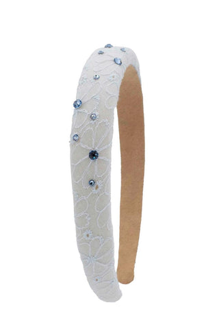 Blue Bari Lynn crystallized eyelet padded headband with decorative embellishments, designed for stylish hair accessories.