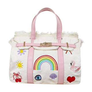 Lola and The Boys Beachkin Bag
White handbag with pink accents and various embroidered designs on a white background