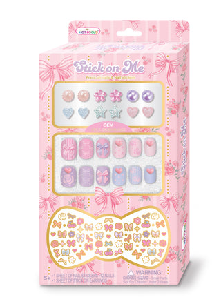 Hot Focus Stick On Me Press On Nails - Bowtiful 
Packaged nail art stickers with decorative designs on a pink background