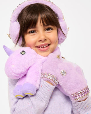Super Smalls Lavender Dreams Jeweled Gloves
Child wearing a purple unicorn plush toy with rhinestone details on a white background
