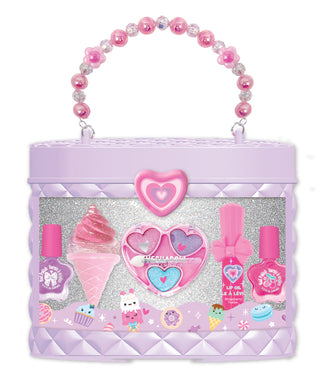 Hot Focus Luxury Beauty - Sweet 
Children's toy makeup set in a purple handbag with heart designs on a white background