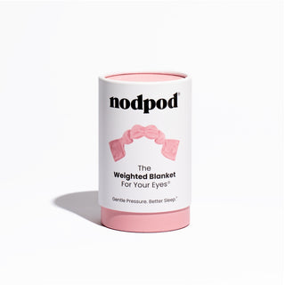 Noppod Weighted Sleep Eye Mask - Blush
White cylindrical container with pink lid labeled 'nodpod' on a white background