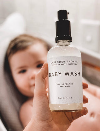 Lavender Thorne Baby Wash soap with lavender scent and gentle formula, shown in a clear container with a light purple cap.