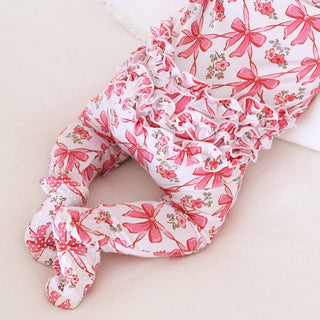 Caden Lane Bow Besties ruffle zipper footie for babies, soft fabric with cute bow details and zipper closure.