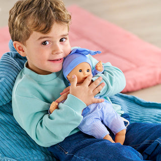 Corolle Bébé Calin 12-inch blue doll with soft body and realistic features, perfect for gentle play and cuddling.