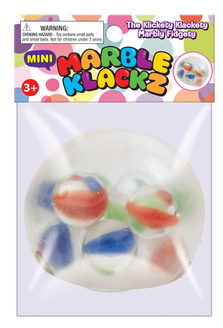 Mini Marble Klackz game by Master Toys featuring colorful marbles and wooden game pieces on a wooden surface.
