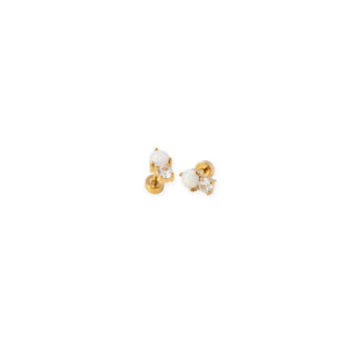 Pip Pop Post Earrings - Opal Dual Stud
A pair of gold stud earrings with heart-shaped clear gemstones, shown on a plain white background.