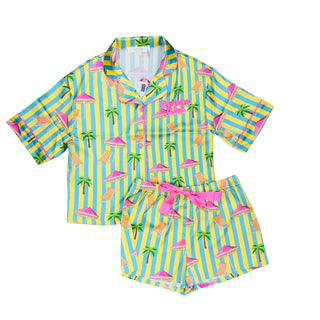 Sunshine Society Kids Silky Short Sleeve Short Set - Cabana Club
Colorful children's shirt and shorts set with beach-themed design on a white background