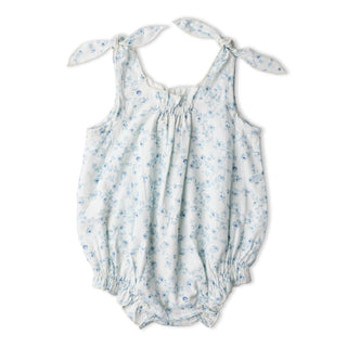 Makemake Organics organic tie shoulder bubble romper with ivy floral print, featuring a relaxed fit and ruffled shoulder straps.