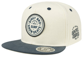 BinkyBro Kids Belhaven Hat
Beige and navy cap with 'Binky Bro' branding on a white background