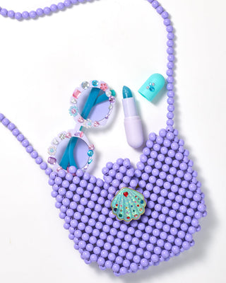 Super Smalls Hana Mermaid Dreams handbag featuring colorful mermaid and ocean-themed design, with a compact, stylish bag shape.
