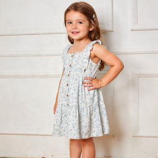 Makemake Organics organic flutter buttoned tiered dress in ivy floral pattern, lightweight and stylish for warm weather wear