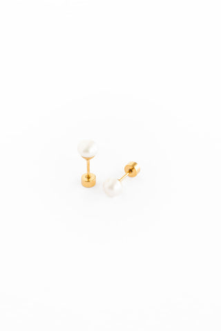 Pearl Pip Pop Post Earrings featuring classic pearl design and silver posts, stylish and elegant jewelry accessory