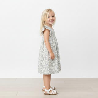 Makemake Organics organic short sleeve flutter dress with tulle floral design, featuring delicate fabric and feminine style.