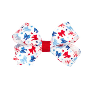 Wee Ones patriotic printed grosgrain hair bow on clip, featuring red, white, and blue stars for children's hair accessory.