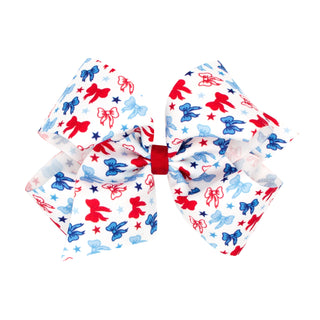 Wee Ones patriotic printed grosgrain hair bow on a clip, featuring red, white, and blue stars and stripes for children.