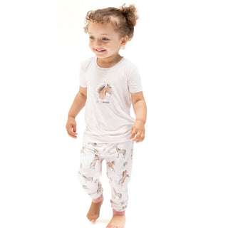 Angel Dear I Love Horses short sleeve pajama set featuring a cozy, horse-themed design on soft loungewear fabric.