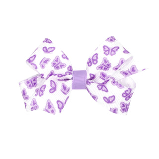 Mini Wee Ones Printed Hair Bow on Clippie - Light Orchid Butterfly
A white ribbon hair bow with a purple butterfly pattern and a purple center band, shown on a plain white background.