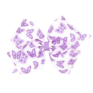 King Wee Ones Printed Hair Bow on Clippie - Light Orchid Butterfly 
A large hair bow made of white fabric printed with a purple butterfly pattern, tied with a matching purple ribbon at the center, shown on a plain white background.