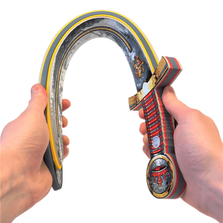 Liontouch Sword - Prince Lionheart
Horseshoe with decorative handle held by two hands on a white background