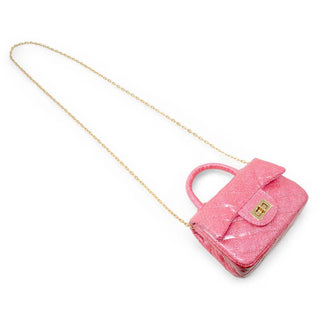 Zomi Gems Classic Sparkle Top Handle Handbag - Pink Lemonade
Pink handbag with a gold chain strap on a white background