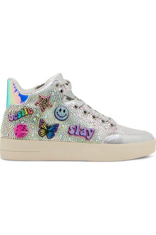 Steve Madden Kid's Delight High Top Sneaker - Silver
A silver high-top sneaker covered in iridescent rhinestones and decorated with colorful patches including a smiley face, butterfly, pink heart, and the words 'be nice' and 'stay'.