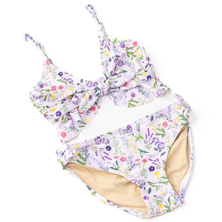 Shade Critters tween girls' ruffle two-piece swimsuit in wildflower fields print, featuring floral design and comfortable swimwear style.