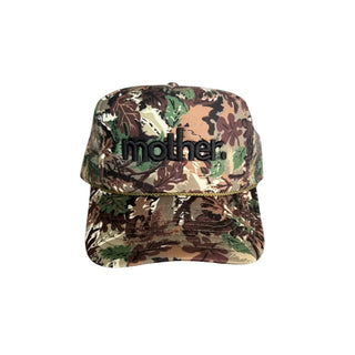 Mother embroidered trucker hat in tree camo pattern with classic mesh back and adjustable snap closure.