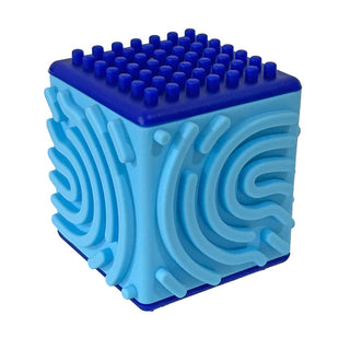 Watchitude Silly Tube Cube toy showing colorful, squeezable rubber cube with playful design and bright colors.