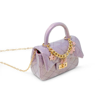 Zomi Gems Classic Sparkle Top Handle Handbag - Baby Purple
Lavender handbag with gold chain and floral decorations on a white background