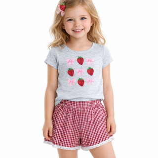 FBZ Strawberries and Bows on Grey Fitted Tee
Young girl wearing a gray t-shirt with strawberry and bow designs and red checkered shorts on a white background.
