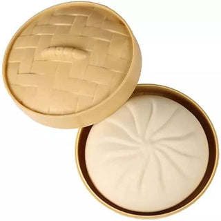 RMS Dumpling Squishy Mystery Bun fidget toy with soft, squeezable material and colorful, textured surface for stress relief and sensory play.
